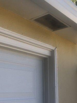 One of the two new soffit vents on detached garage