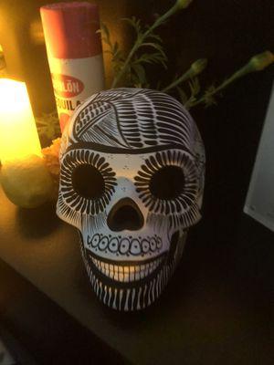 One of the sugar skulls as decorations