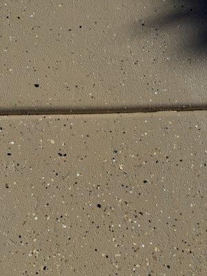 Close up of driveway coating.