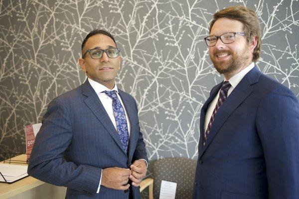 Daniel Vaswani (Owner/Senior Attorney) and Joseph McPeak (Senior Attorney).