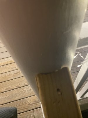 Front porch railing cut to be flush against pillar