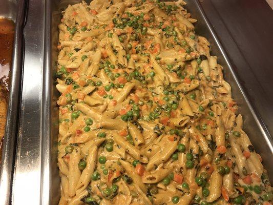 Freshly made penne pasta with mixed vegetables