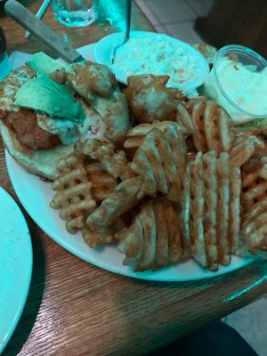 Buffalo Chicken Sandwich with coleslaw and waffle fries