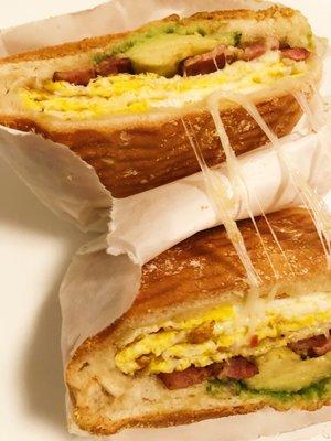 Breakfast sandwich. Bacon, egg, cheese & avocado. $5.99