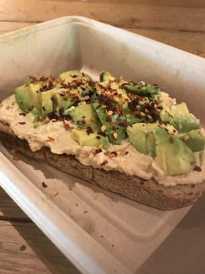 Avocado toast with hummus and chili flakes - a great pre-workout lunch!