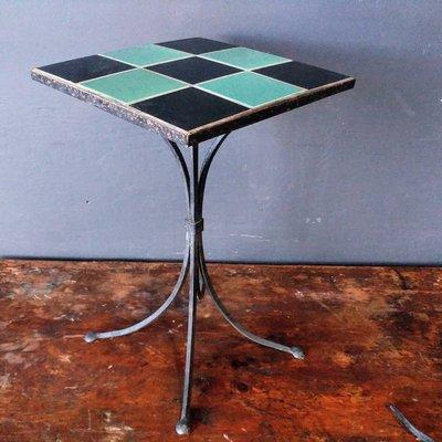 Wrought iron tile top side table.