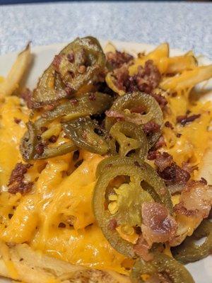 cheese fries with bacon and jalapeños