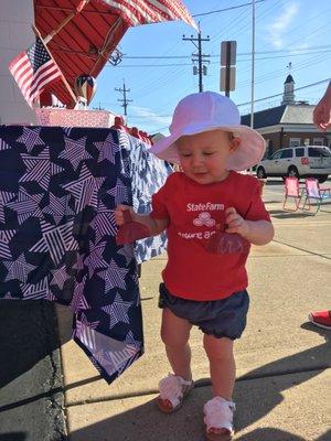 Ellie loves the State Farm cowbells we were giving away!