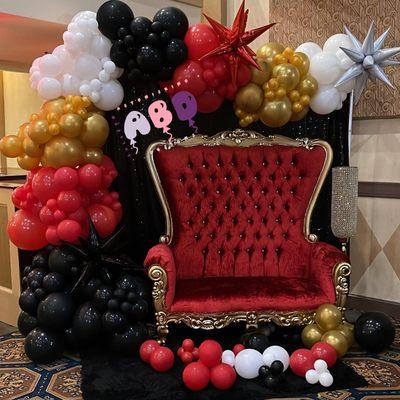 Organic Balloon Garland paired with our rental throne loveseat