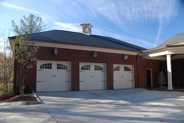 Custom carriage style garage doors and additions.