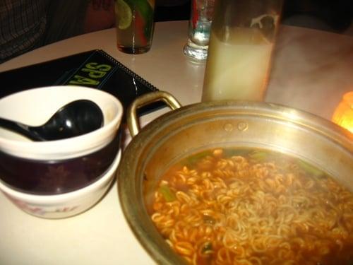 ramen... cooked ol' skool Korean style! look at the pot! haha.