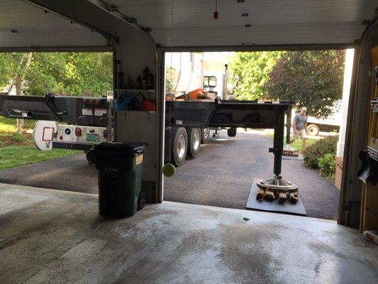 The Barretts' crane in our driveway, ready to pull trees from our backyard, over the house, to the chipper.