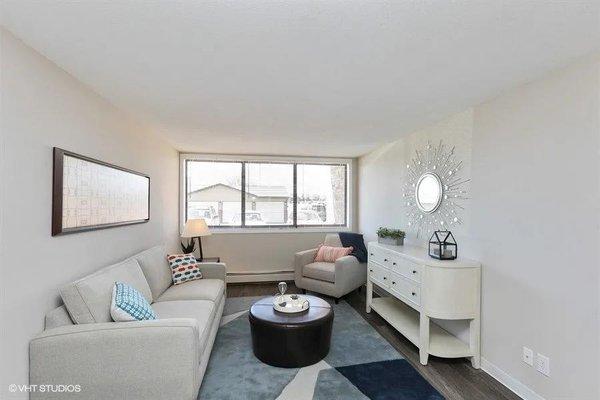 Living room space in an updated one-bedroom. Spacious with big windows to let in some natural sun light!