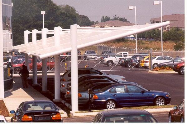 Parasol created and installed this unique metal canopy with hangers for BMW at one of their Mid-South car dealerships.