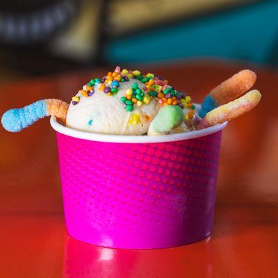 Birthday cake Ice cream topped with sour gummy worms and nerds