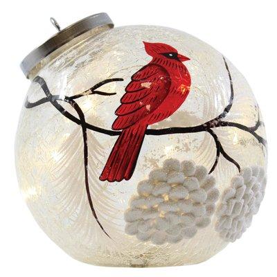 Snowy Cardinal Tabletop Ornament.  This gorgeous decoration lights up to brighten your home all season long.