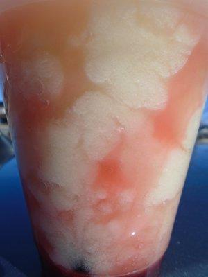 Red raspberry lemonade smoothie, close-up.