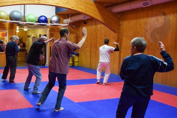 Tai Chi is an adult class helpful for balance and flexibility.