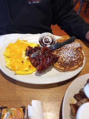 Scrambled eggs honey Chipotle chicken and pancakes