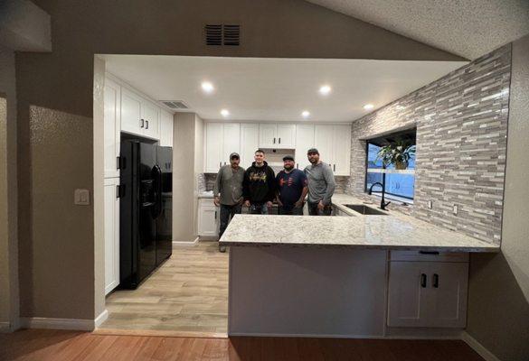 New kitchen, new flooring, raised ceiling, new tile floor in kitchen.