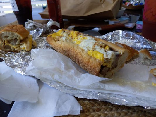 Sausage egg and cheese sandwich "large", total of 18 inches $14.  As good as it is long.  (9 inches pictured here.)