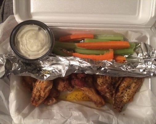 Lemon Pepper wings with carrot and celery sticks.