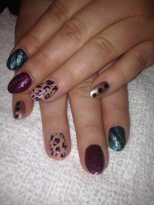 Nail art on each nail on Miss Chelsea.. She let me play. Shellac and other fun stuff!