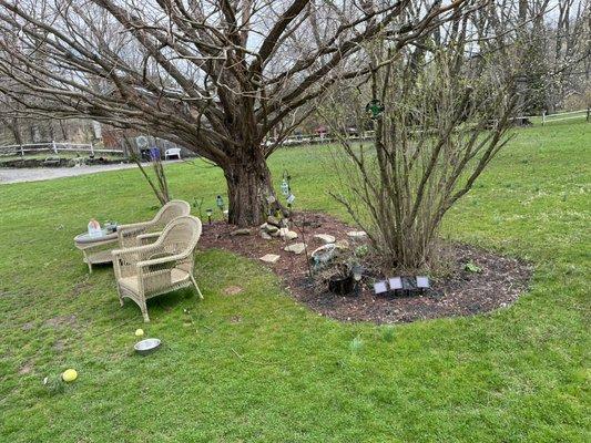 Before edging, reshaping the bed and mulching.