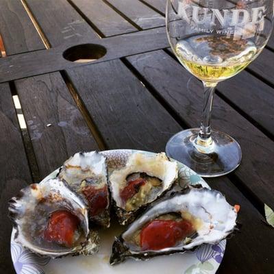 BBQ oysters with a Pinot Grigio. follow @bishimighteat on Instagram for more!