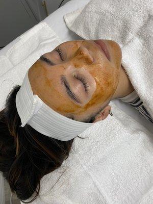 Facial with pumpkin enzyme mask