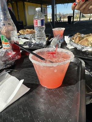 Strawberry margarita with sugar in the rim