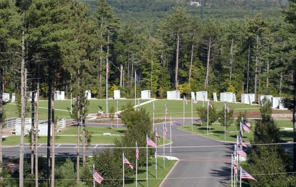 Entrance driveway into circle of flags.