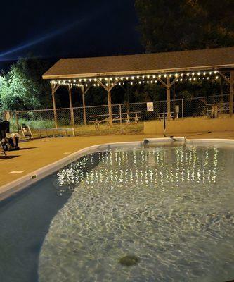 Pavilion with lights from summer nights by the pool.