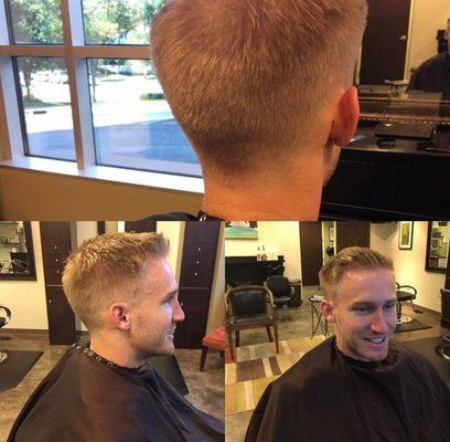 Traditional business man cut to short taper.