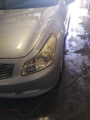 Before Photo..Headlight Restoration On A 2009 Infinity. You Can See It's Been Through Some Storms. Cloudy And Yellow. We Went To Work.