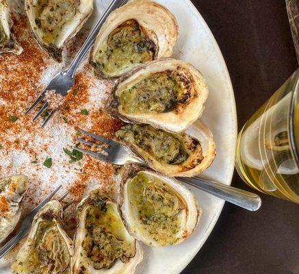 Charleston Style Oysters, grilled in shallot butter.