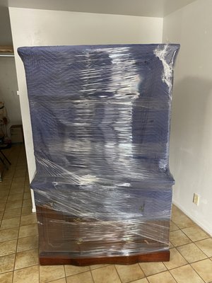 Glass wardrobe padded and wrapped