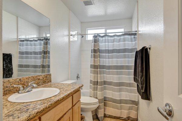 Matching cabinetry and counters throughout