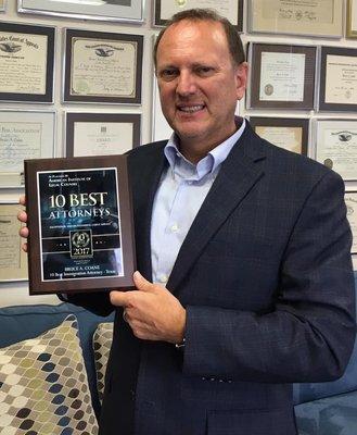 Bruce Coane receives Top 10 Best Attorneys in Texas award for immigration law.