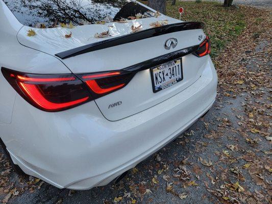 Tinted tail light and tinted infiniti trunk logo