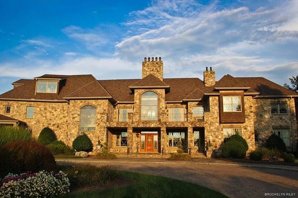 This 14,000 square foot stone mansion sits on a 300 acre estate in the rolling countryside of Cabarrus County, NC.