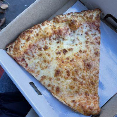 Cheese pizza slice from the Bomboloni vending machine