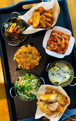 Side Pieces including crispy potato wedges, smoked collards, bacon mac & cheese and more