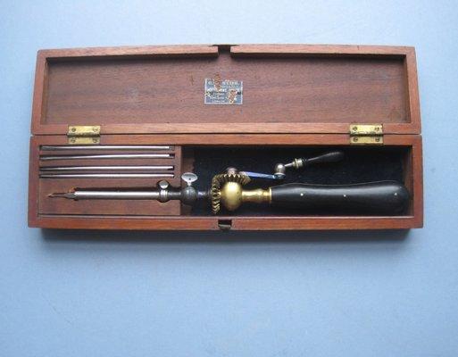 A classic,late-19th-century,  Collin-type bone drill/trephine; complete and nicely cased in mahogany.