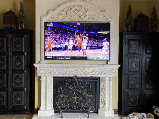 60" TV over 44" tall mantle