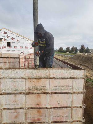 Pouring basement walls using a pump truck