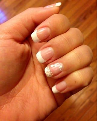 For my wedding nails I wanted the ring finger to be a little fancier. So classic white French too with a lace design.