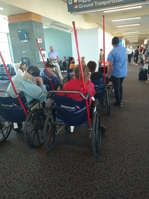 PVD ARRIVAL - I was told I was not allowed to leave while waiting w/ the disabled. Yet, other patrons left their family to collect luggage.