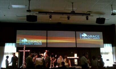 Giant screens over the pulpit inside the sanctuary.