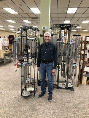 Owner Garry Jordan and wind chimes!